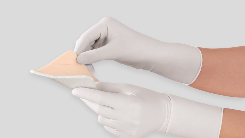 Askina® DresSil being applied.