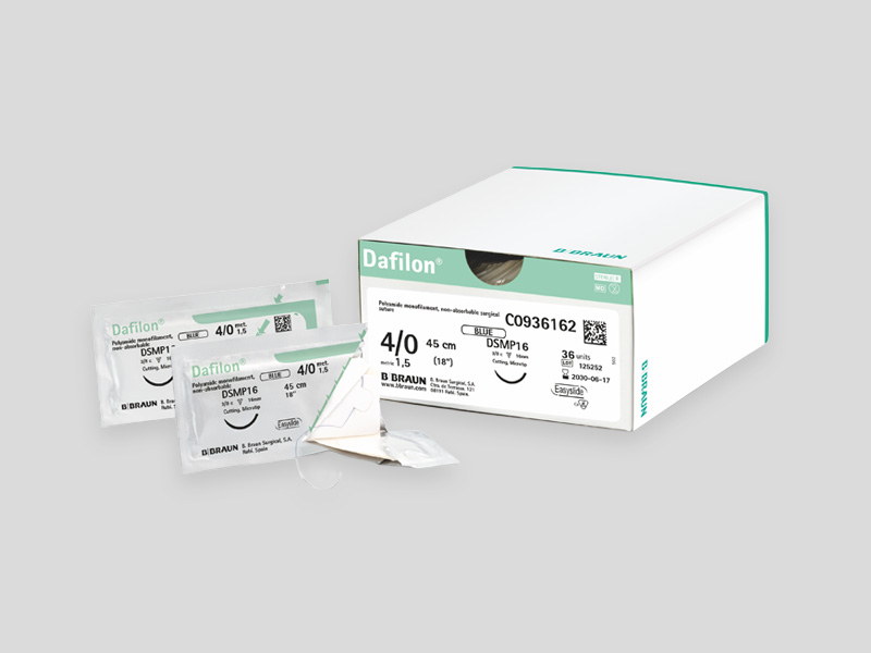 Dafilon® non‑absorbable surgical suture with a curved needle and blue monofilament thread, isolated on a light background.