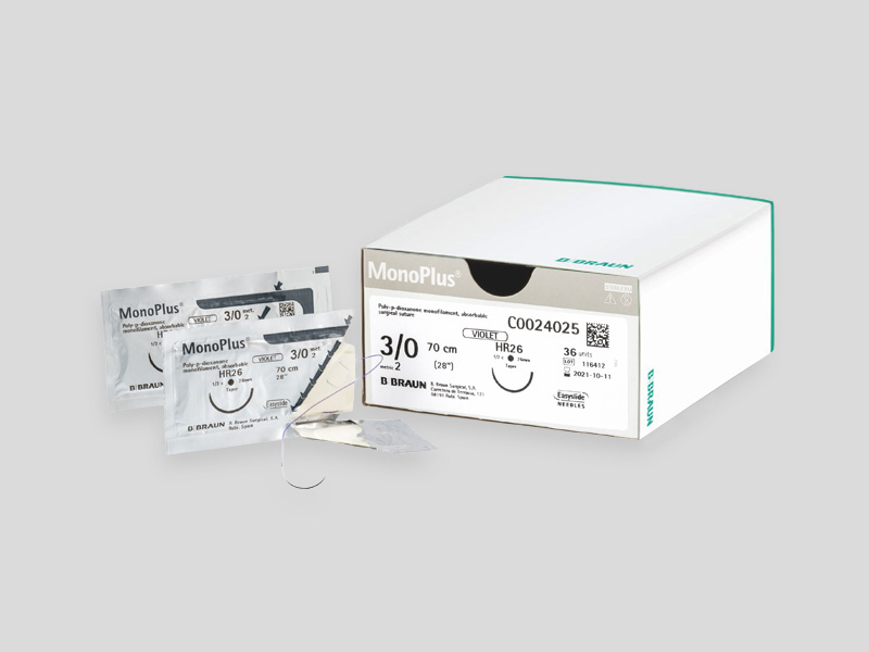Product display for MonoPlus® monofilament suture material, showing a green information panel on the left and product packaging on the right, including a white box and several individually wrapped suture packs.