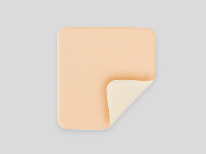 Square beige adhesive pad with one corner peeled back.